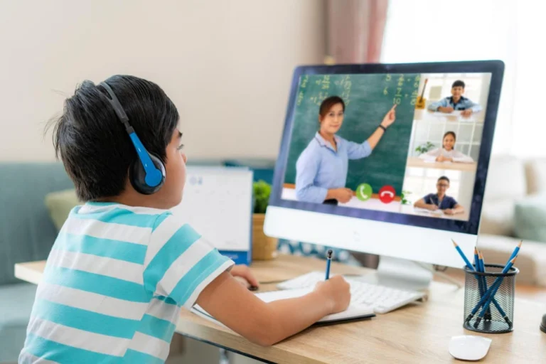 A child studying online tuitions by Zola Learning Academy
