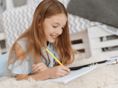 A beautiful teen doing homework